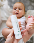 Mum with baby using Pod Organics baby oil